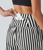 Short ample de yoga 2 en 1 taille haute à rayures, 17,5 cm (7 pouces), avec poches
