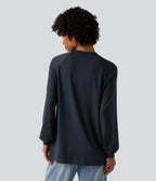 Blouse mesh contrastant col rond manches raglan longues