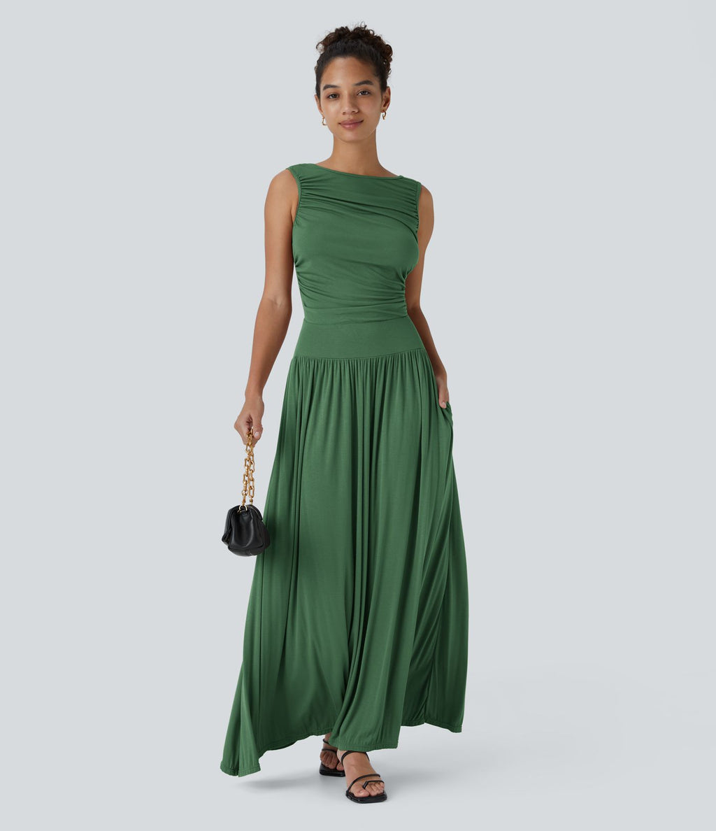 Robe longue à encolure bateau, bretelles asymétriques, côtés froncés et poches