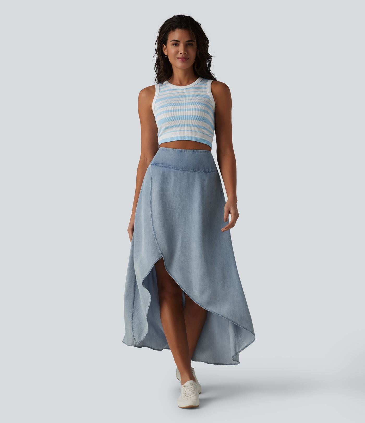 Jupe en jean midi fluide drapée en lyocell taille haute avec fermeture éclair invisible, ourlet asymétrique et poches