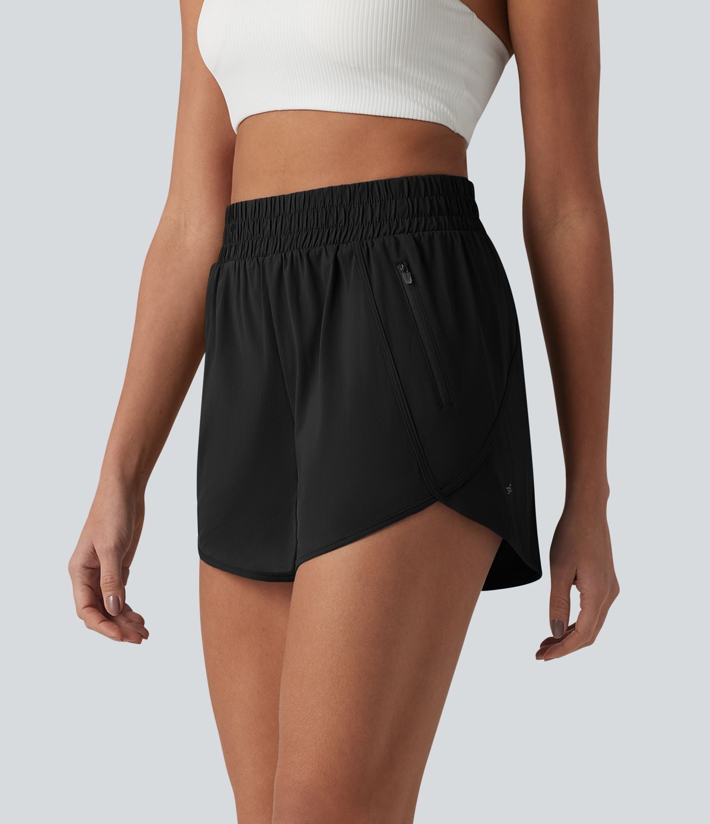 Short de yoga 7,5 cm taille haute à ourlet arrondi et poches