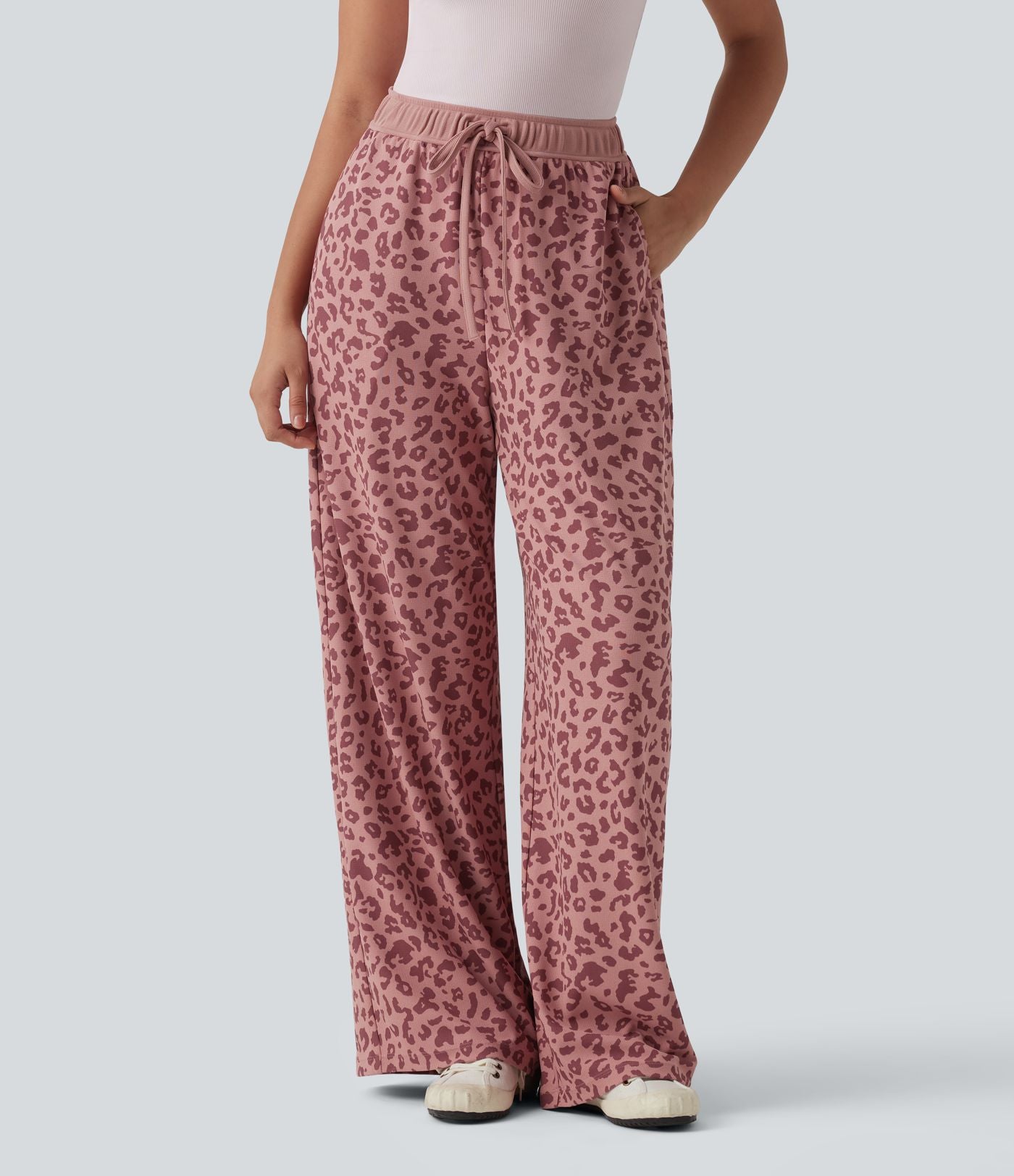 Pantalon casual large gaufré imprimé léopard taille haute avec cordon de serrage et poches
