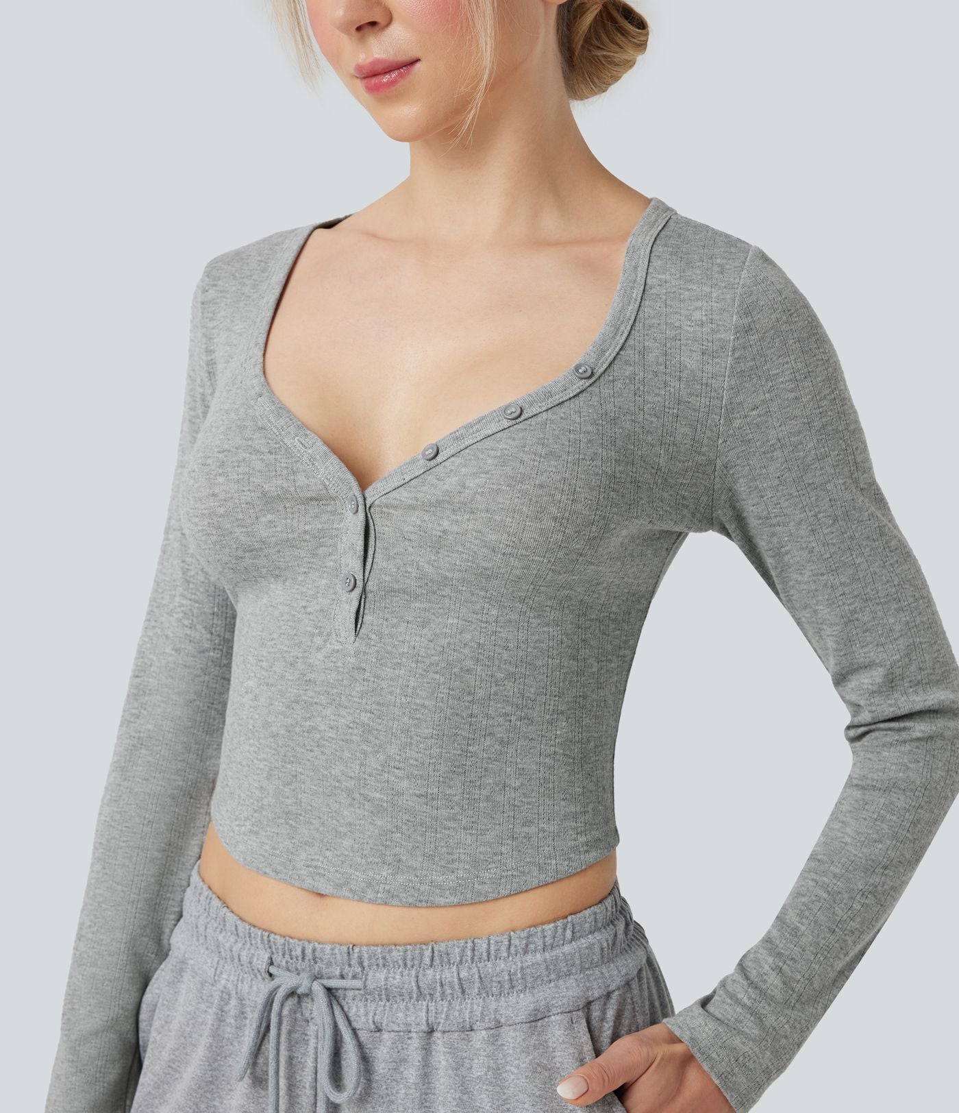 Haut détente cropped maille côtelée col henley manches longues