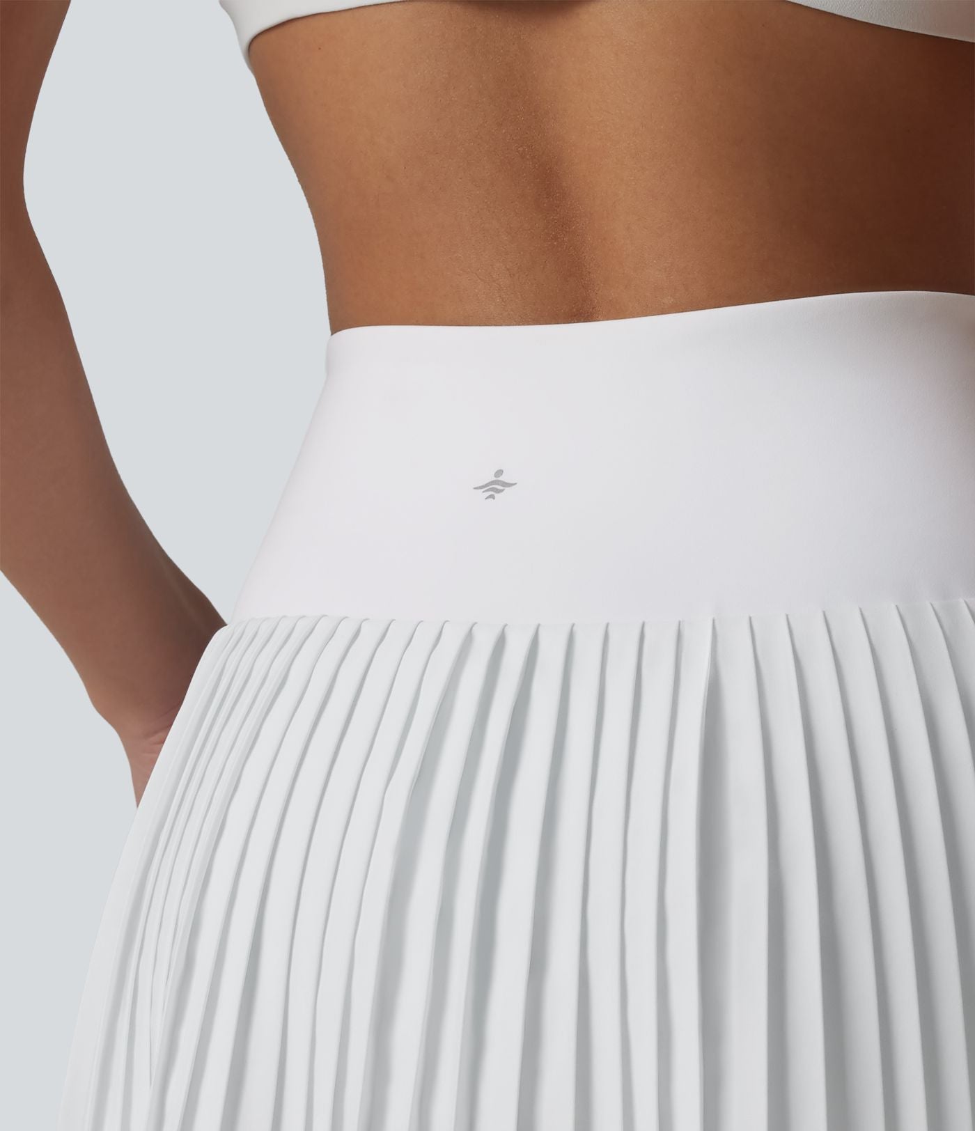 Breezeful™ Jupe mini de tennis plissée 2 en 1 taille haute séchage rapide avec poches
