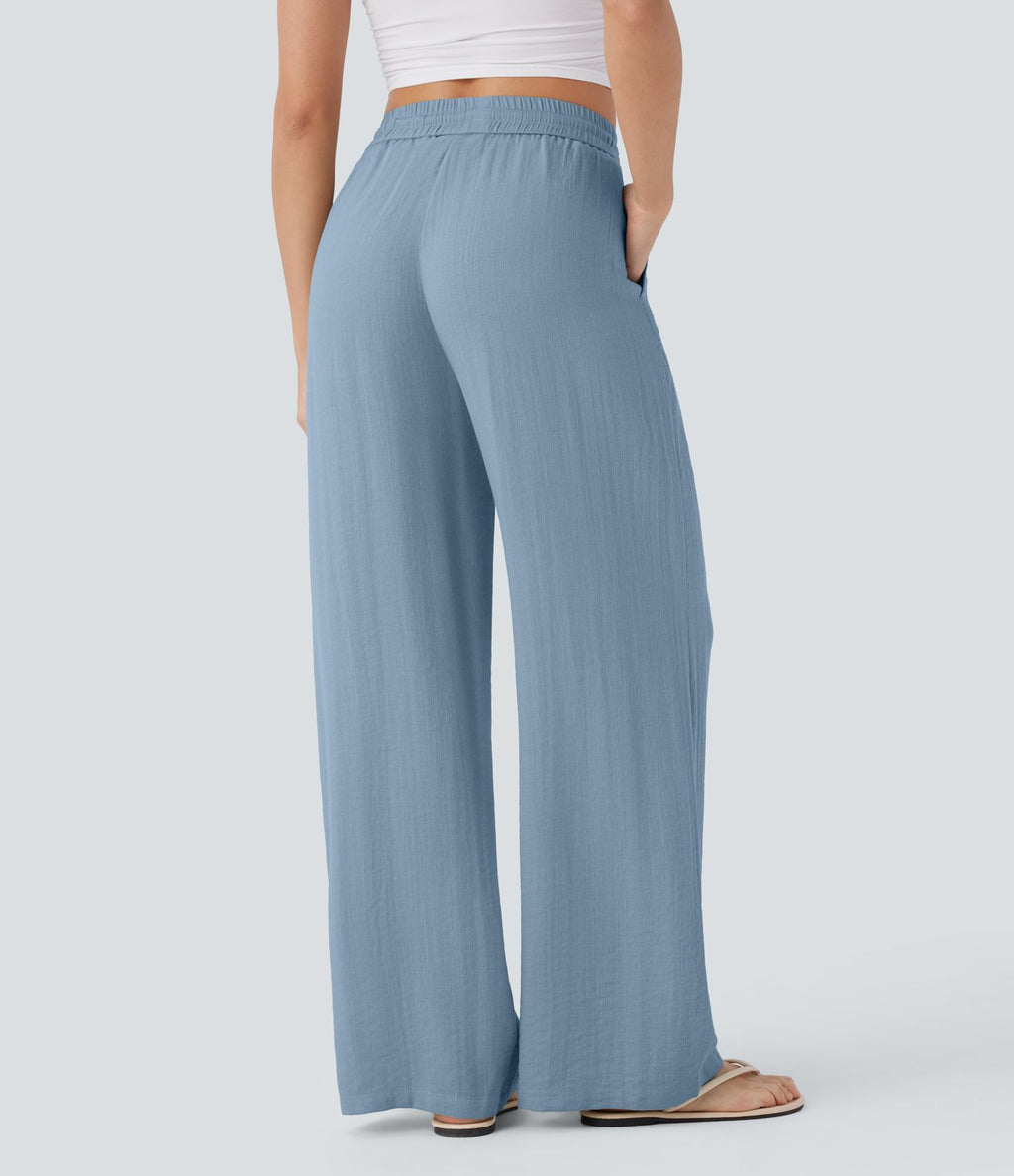Pantalon large fluide taille haute avec cordon de serrage, poches latérales et aspect lin