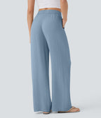 Pantalon large fluide taille haute avec cordon de serrage, poches latérales et aspect lin