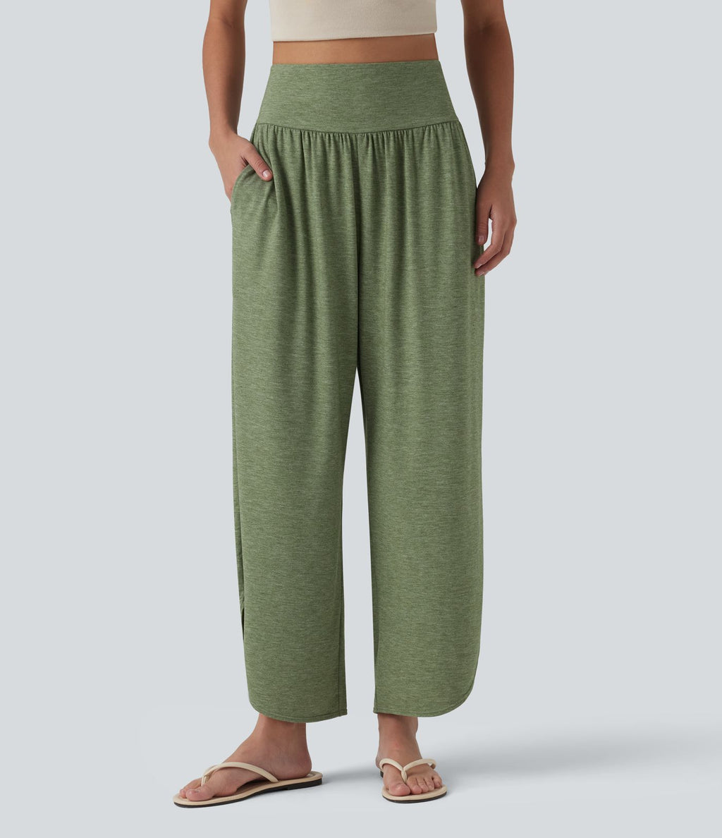 Pantalon décontracté taille haute gainant avec ourlet arrondi et poches