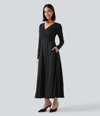 Robe mi-longue deux pièces à manches longues effet cache-cœur avec nœud au dos et poches