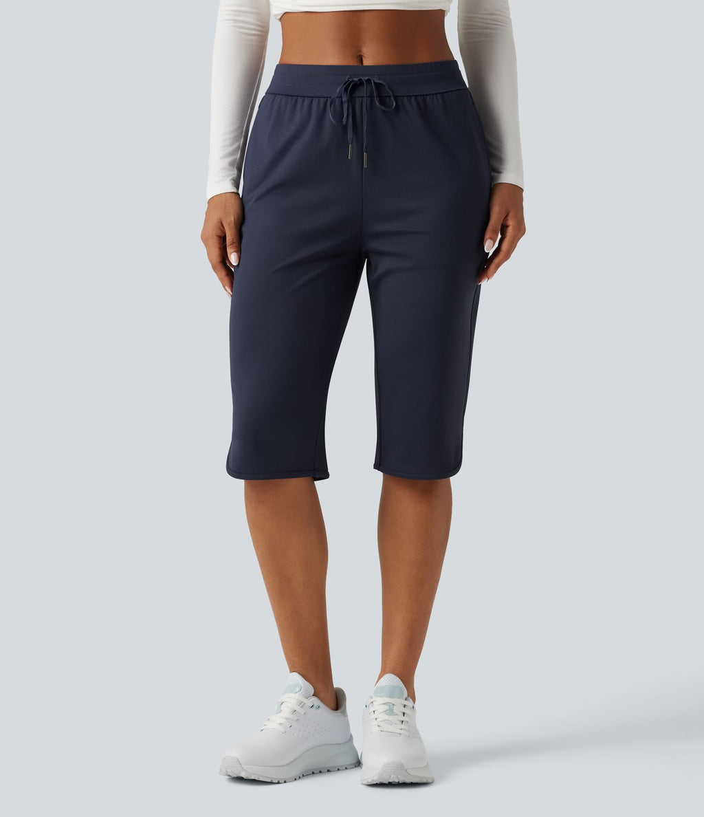 Pantacourt de golf taille mi-haute à séchage rapide avec cordon de serrage, ourlet arrondi, poches et protection solaire UPF40+