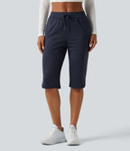Pantacourt de golf taille mi-haute à séchage rapide avec cordon de serrage, ourlet arrondi, poches et protection solaire UPF40+