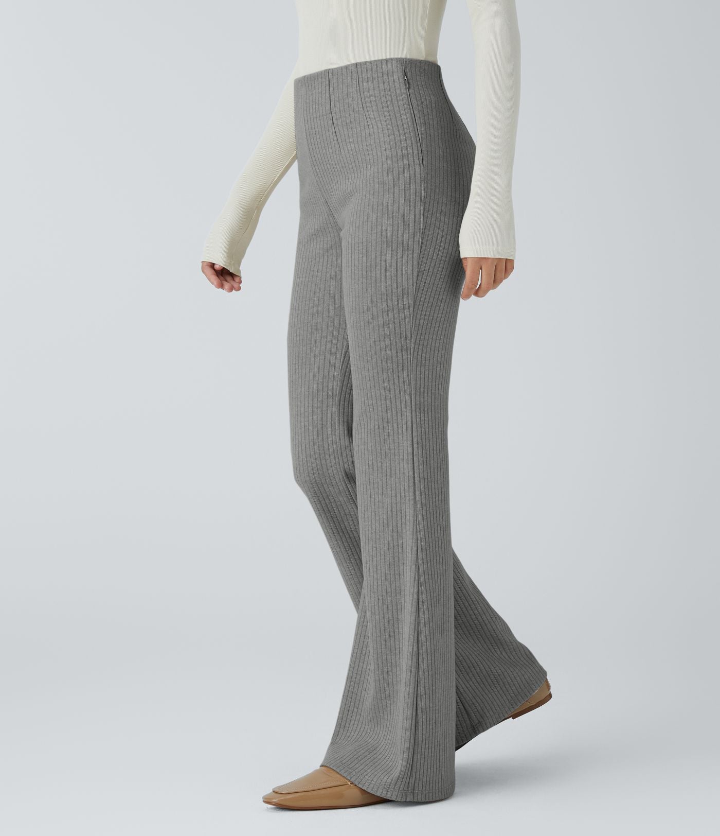 Pantalon décontracté évasé en maille côtelée à taille haute et poches zippées latérales