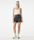 Short baggy de sport taille haute à séchage rapide avec bandes latérales et poches