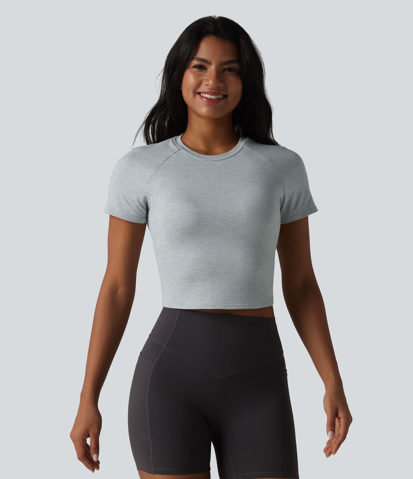 Haut de sport yoga col rond manches courtes avec soutien-gorge intégré