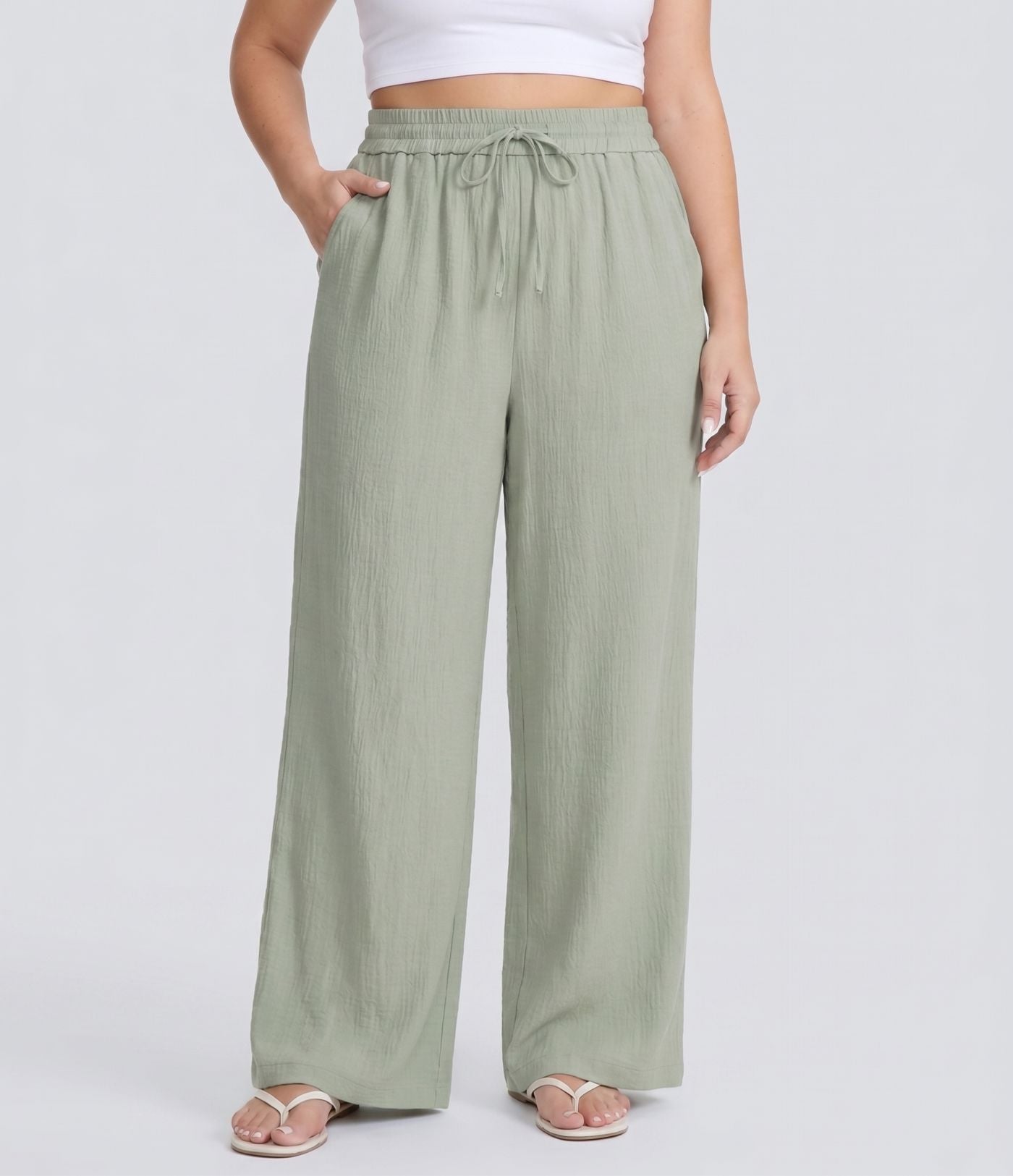 Pantalon décontracté grande taille large fluide taille haute effet lin avec cordon de serrage et poches
