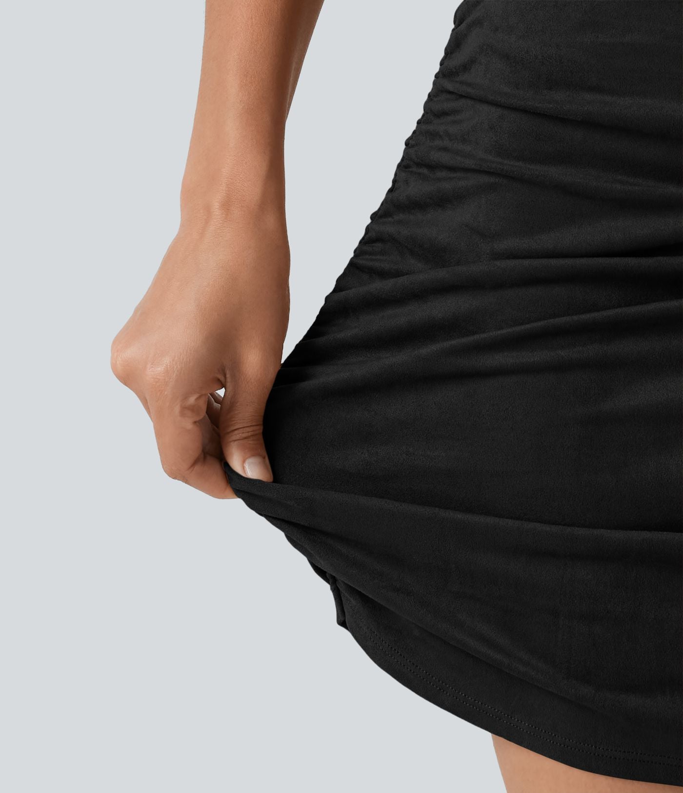Jupe mini moulante 2-en-1 en daim ventre plat, taille haute, fronces, ourlet arrondi — version longue