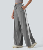 Pantalon running large à rayures taille haute avec cordon de serrage, séchage rapide et effet frais InstantCool avec poches, protection solaire UPF40+