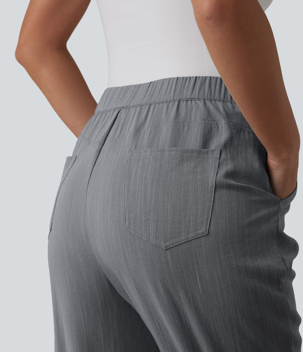 Pantalon tailleur aspect lin fuselé taille haute asymétrique avec poches