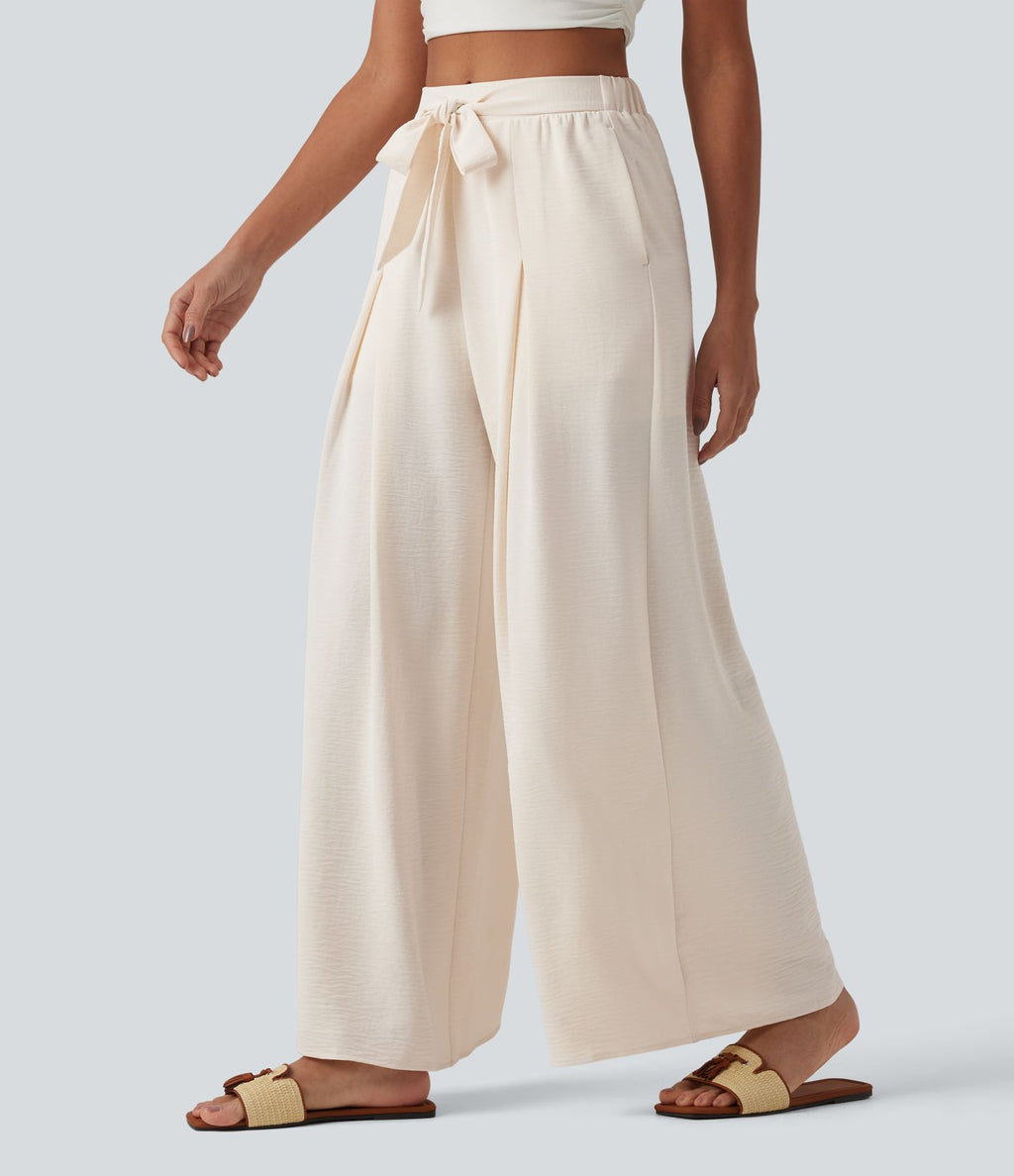 Pantalon large resort taille haute aspect lin avec nœud frontal et poches - Short intégré