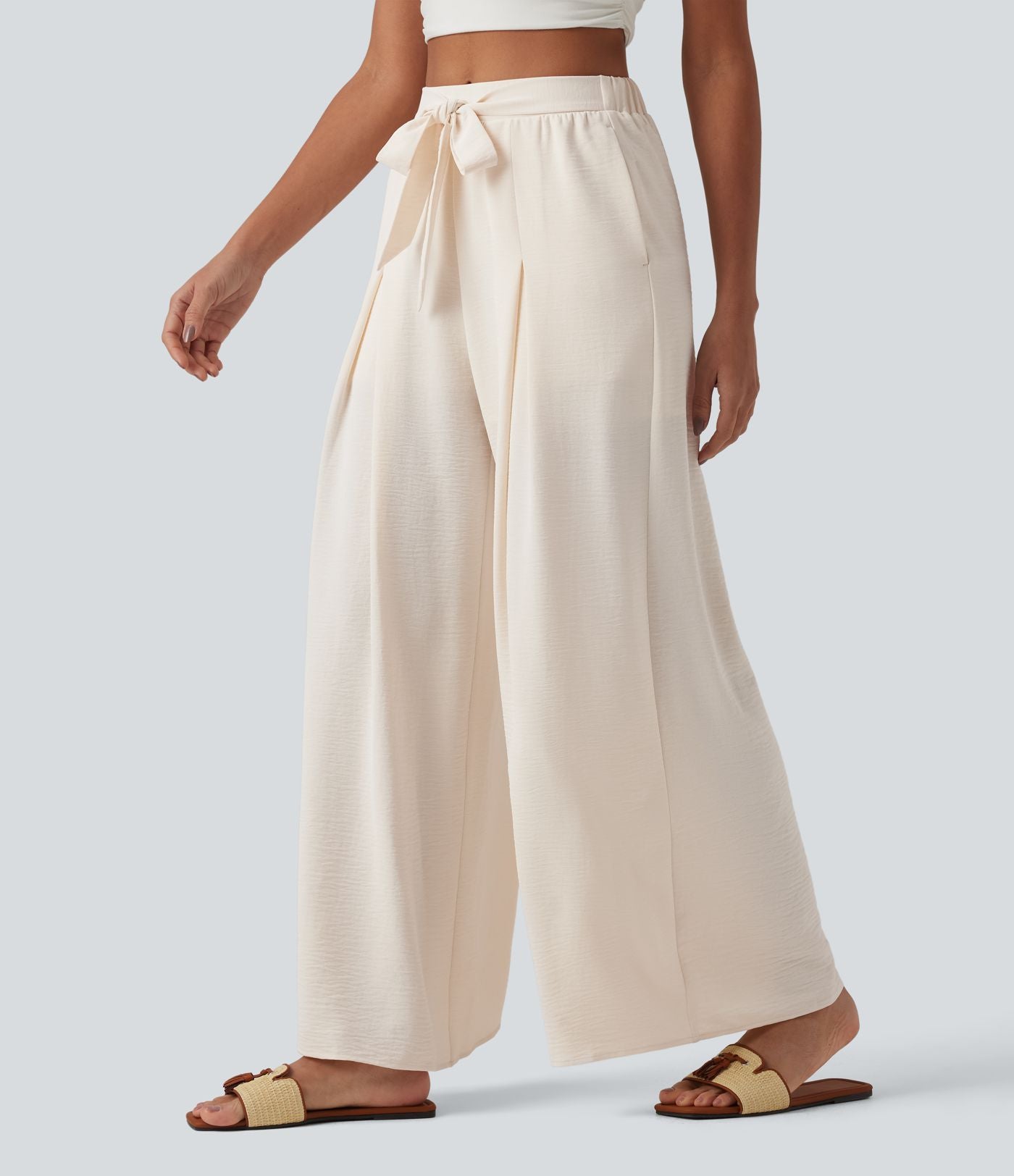 Pantalon large resort taille haute aspect lin avec nœud frontal et poches - Short intégré