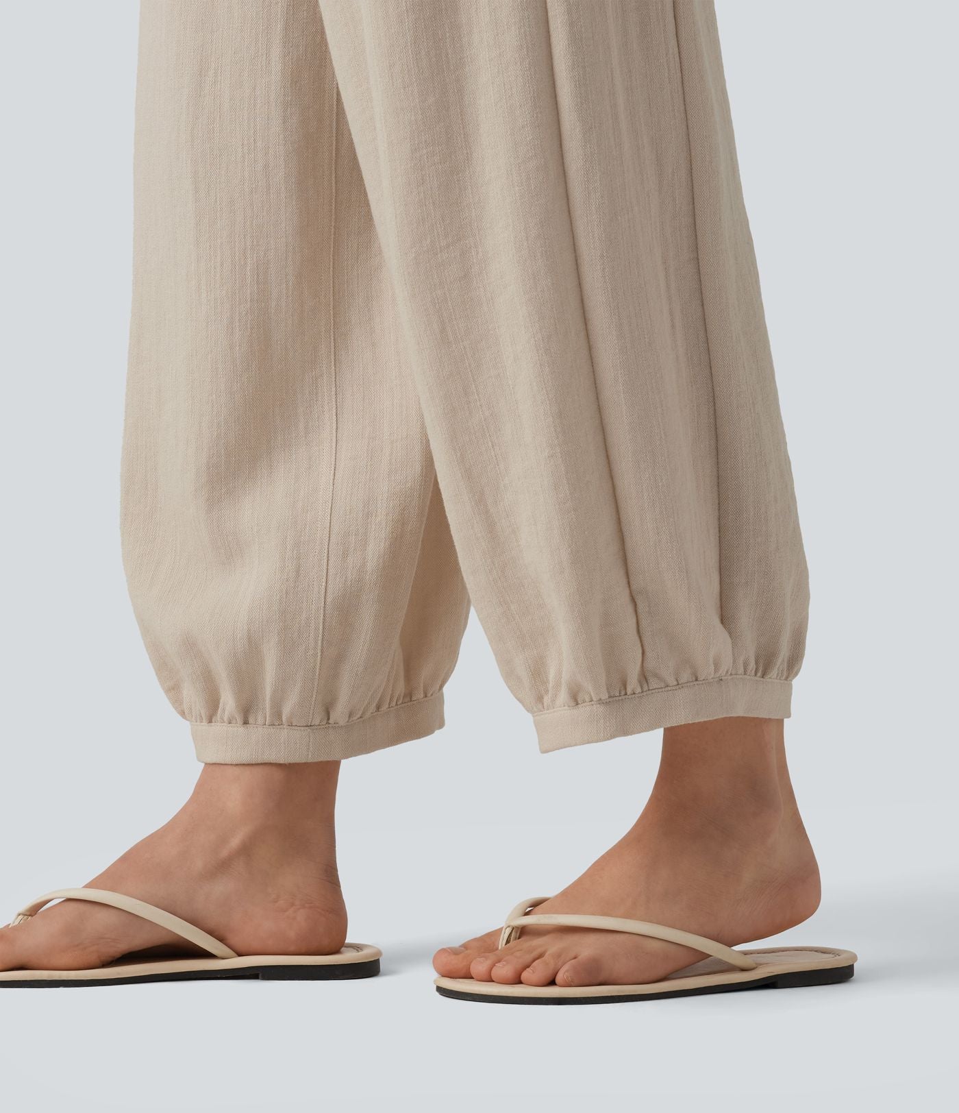 Pantalon casual bouffant aspect lin avec fronces taille haute et poches
