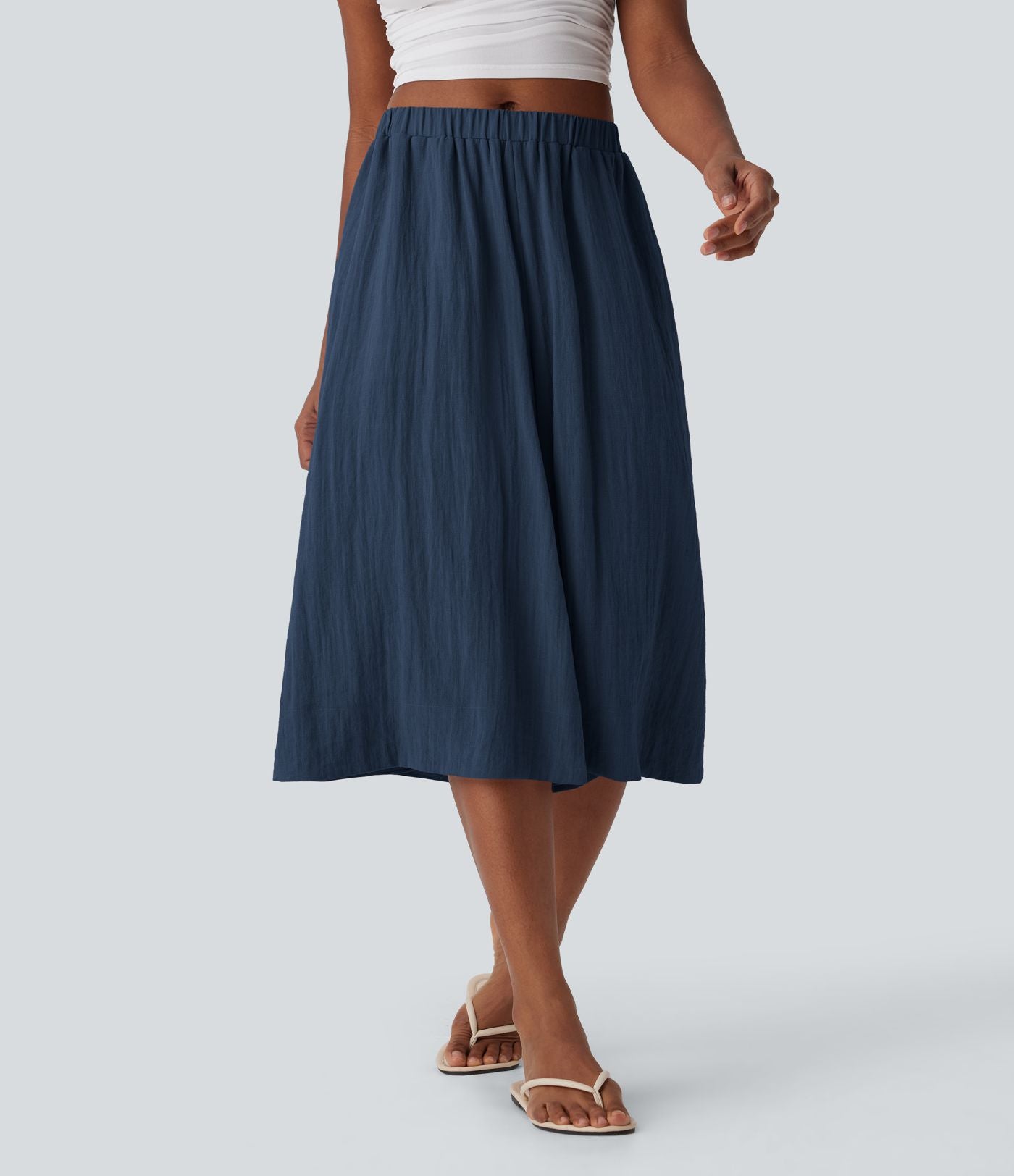 Pantalon fluide large taille mi-haute effet lin avec poche