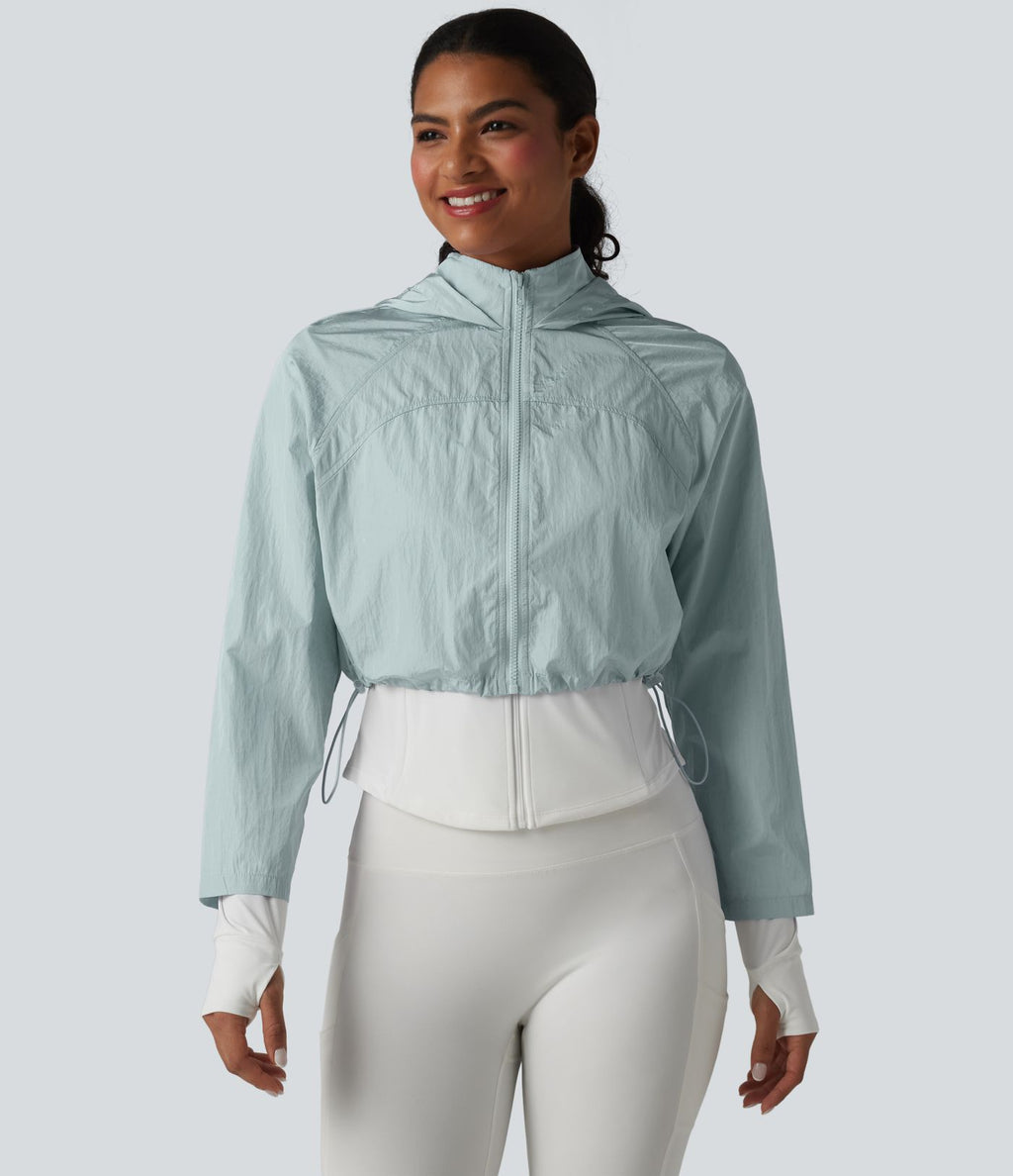 Veste de running 3-en-1 déperlante à capuche avec trous pour les pouces, ourlet arrondi et poches