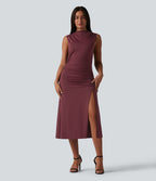 Robe décontractée moulante mi-longue col cheminée sans manches avec fermeture éclair invisible froncée et fente