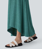 Robe longue décontractée fluide à col rond, sans manches, poches latérales et ourlet asymétrique