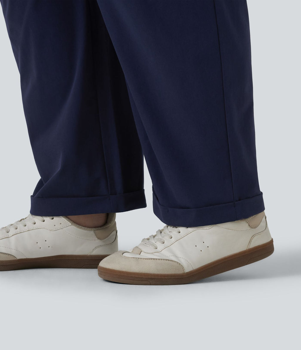 Pantalon grande taille en popeline stretch taille haute, plissé avec ourlet roulotté, longueur 7/8, coupe fuselée, avec poches