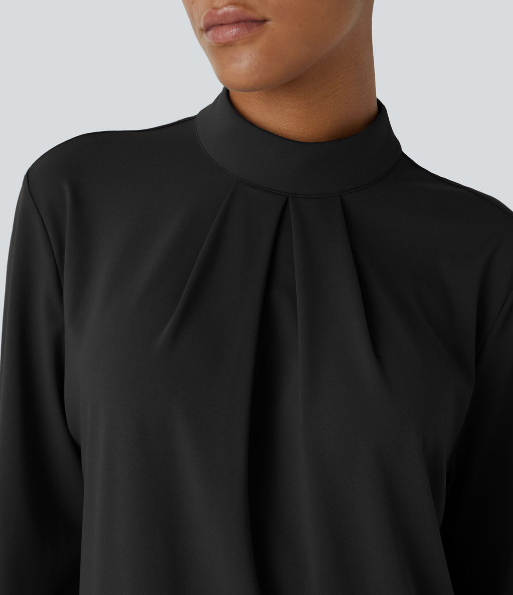 Blouse de travail à col montant, plis, boutons au dos et manches longues