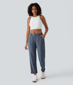 Pantalon casual taille mi-haute en maille gaufrée avec poche zippée