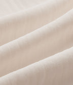 Pantalon ample décontracté à taille mi-haute, fentes, aspect lin, cordon de serrage et poches