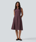 Robe mi-longue évasée de travail col cranté sans manches avec poches