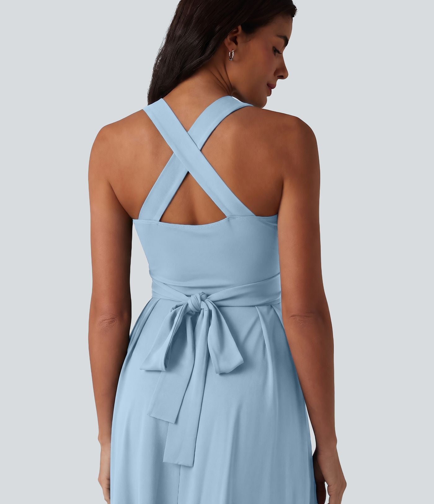 Robe midi fluide sans manches décolleté cœur avec bretelles croisées, nœud dans le dos et poches