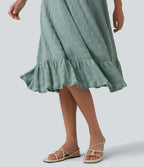 Robe midi sans manches à encolure arrondie avec coussinets amovibles et ourlet à volants