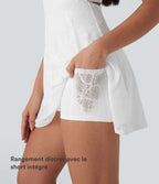 Robe-short 2-en-1 mini de danse active avec dos nu, détail torsadé, dentelle et poches-Easy Peasy