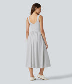 Robe fluide décontractée midi sans manches dos nu croisée à pois avec poches