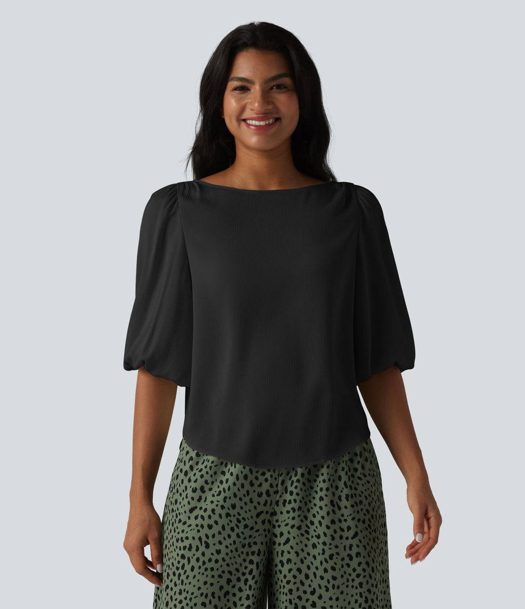 Blouse décontractée à manches bouffantes et ourlet arrondi texturé