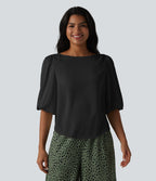 Blouse décontractée à manches bouffantes et ourlet arrondi texturé