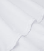 Pantalon fluide et ample avec superposition en mesh, poches latérales et taille haute