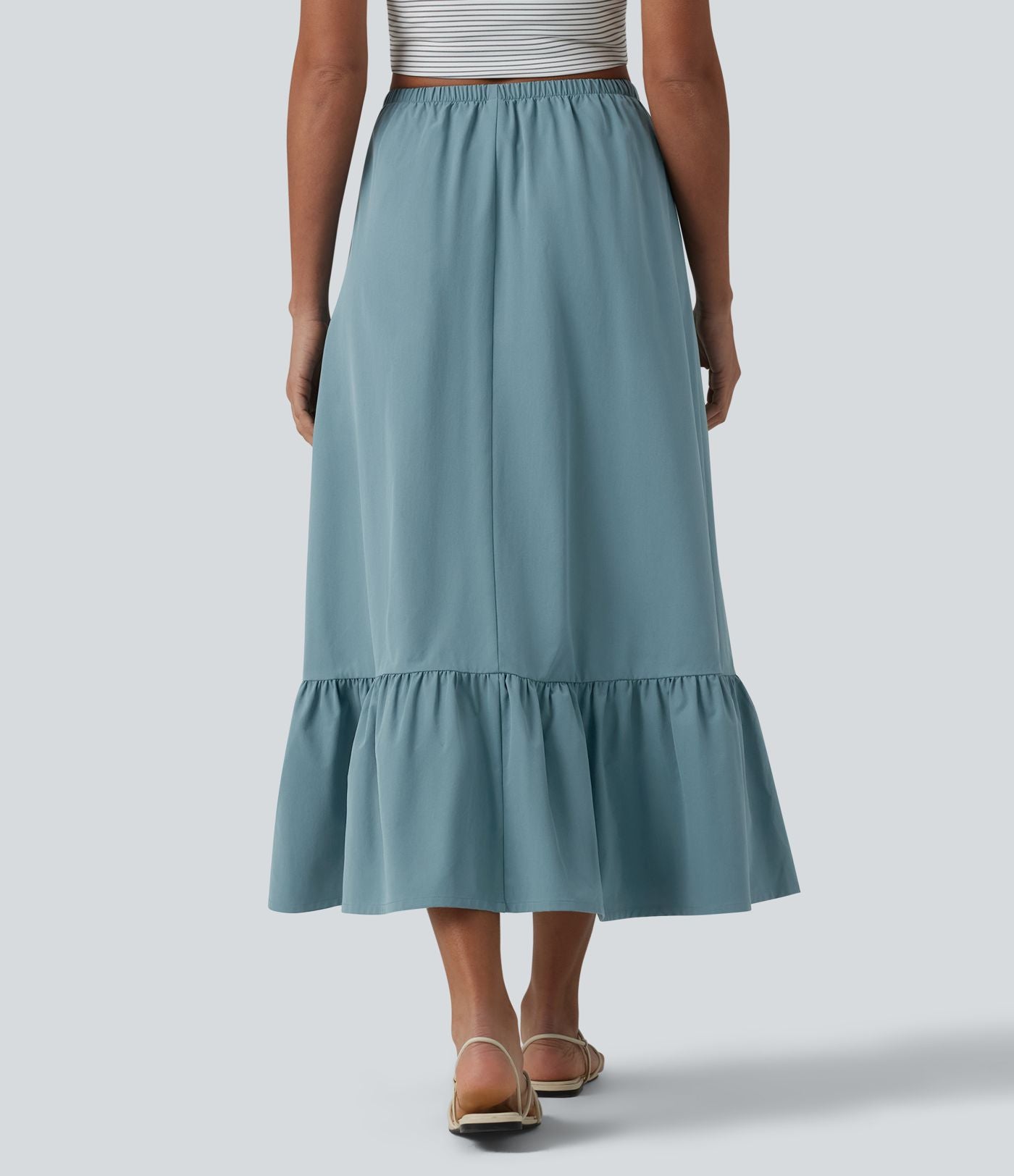 Jupe casual mi-longue évasée en popeline stretch taille haute avec cordon de serrage, ourlet volanté et poches