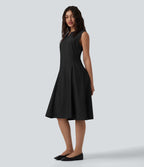 Robe mi-longue évasée de travail col cranté sans manches avec poches
