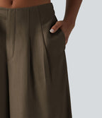 Pantalon large fluide taille haute en lin mélangé avec poches et liens latéraux