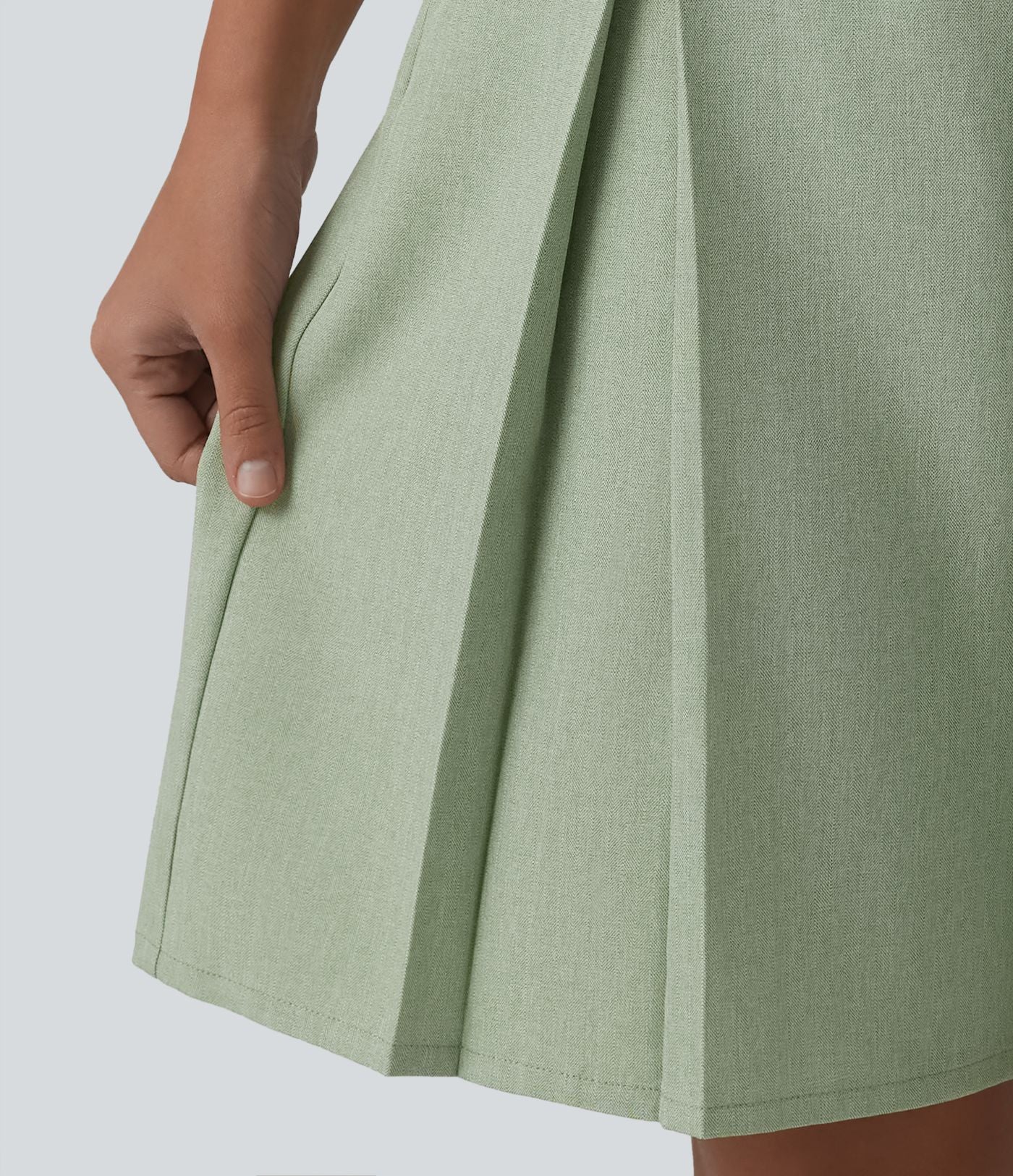 Bermuda ample infroissable taille haute plissé aspect lin avec fermeture éclair invisible et poches