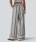 Pantalon large taille haute à rayures avec ceinture et poches