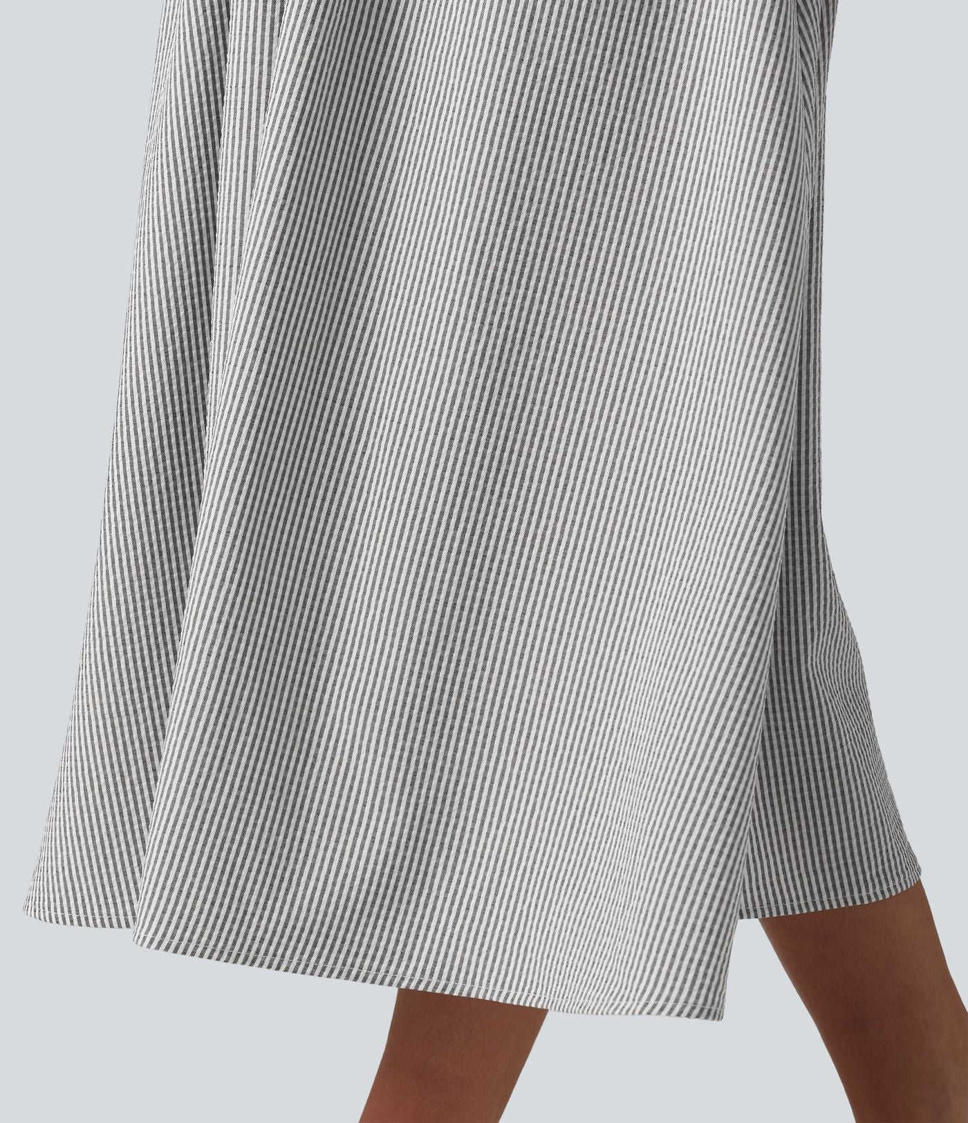 Robe midi rayée sans manches à col en V et poches