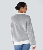Pull col rond motif rayé bicolore à manches longues