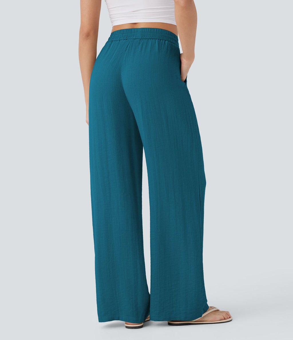 Pantalon large fluide taille haute avec cordon de serrage, poches latérales et aspect lin