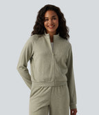 Veste casual côtelée à col montant, manches longues et fermeture zippée avec poches