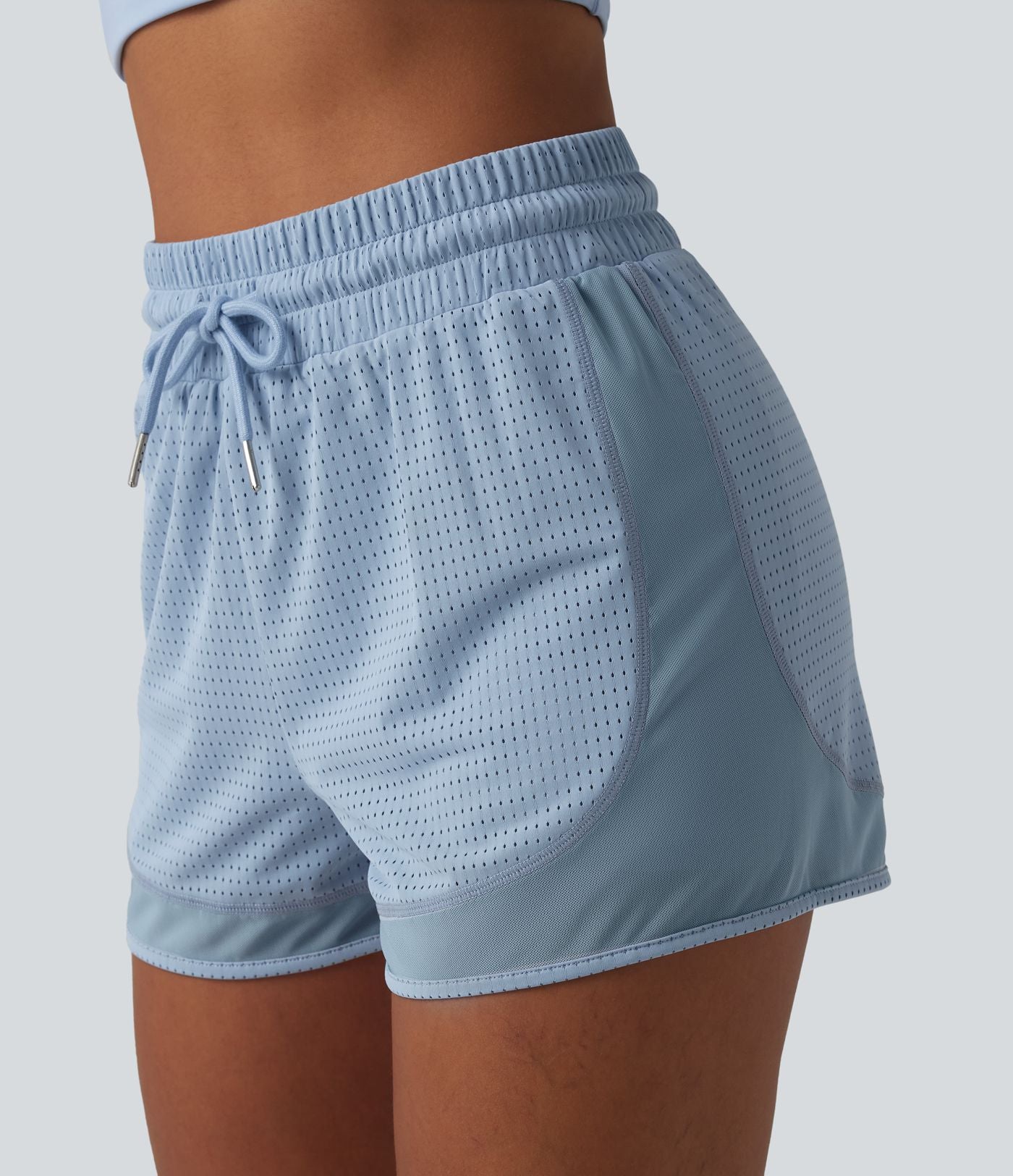 Short de sport 2 en 1 taille haute, cordon de serrage et œillets, en maille respirante